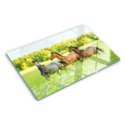 Tabla de cortar Un encuentro de caballos en el campo.