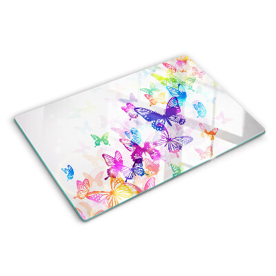 Tabla para cortar Un motivo de mariposas coloridas volando.