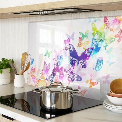 Tabla para cortar Un motivo de mariposas coloridas volando.