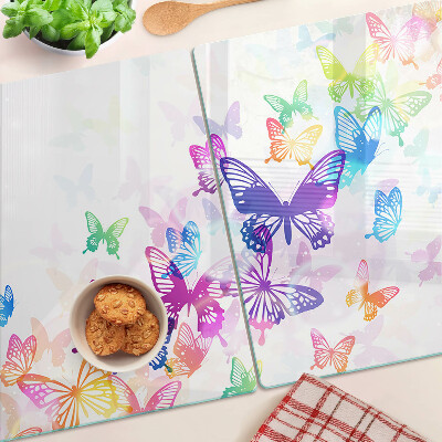 Tabla para cortar Un motivo de mariposas coloridas volando.