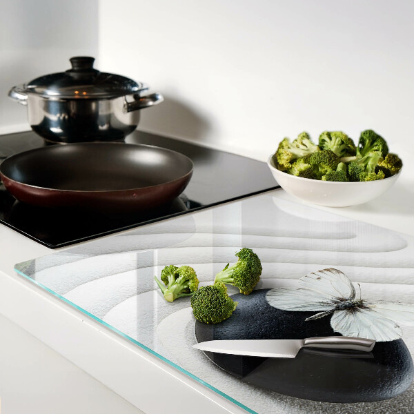 Tabla de cortar de cristal Motivo de mariposa sobre piedra