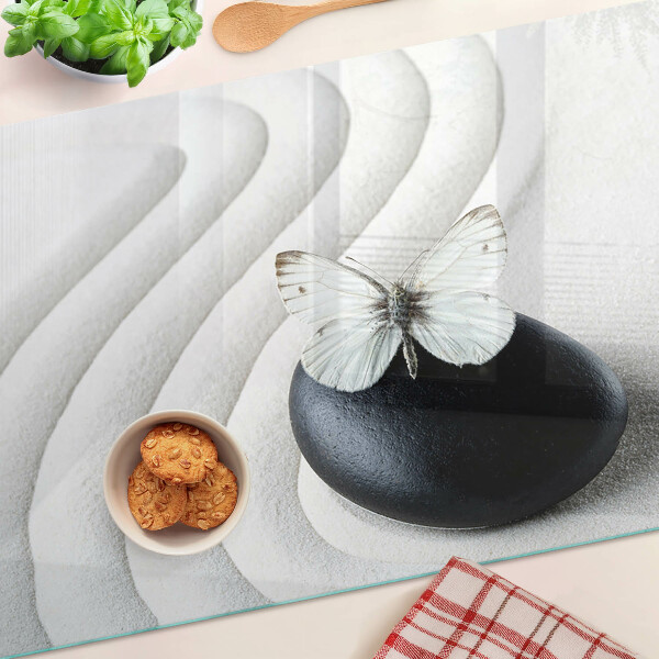 Tabla de cortar de cristal Motivo de mariposa sobre piedra