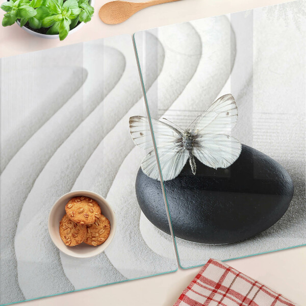 Tabla de cortar de cristal Motivo de mariposa sobre piedra