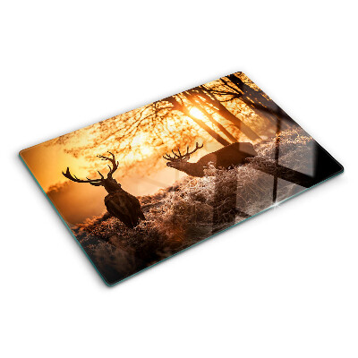 Tabla de cortar Ciervos en el bosque al atardecer