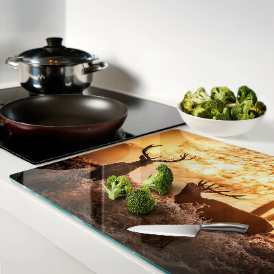 Szklana deska do krojenia Jelenie w lesie o zachodzie słońca