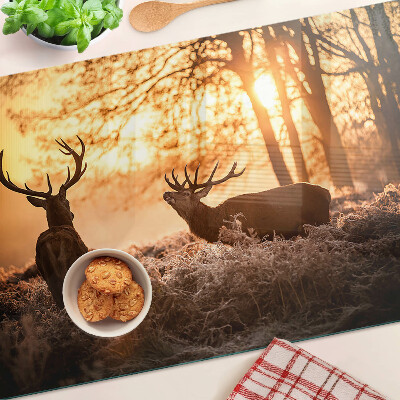 Szklana deska do krojenia Jelenie w lesie o zachodzie słońca