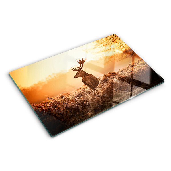 Tabla de cocina Ciervos contra el fondo del atardecer