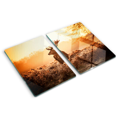 Tabla de cocina Ciervos contra el fondo del atardecer