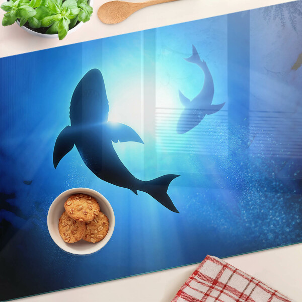 Tabla de cortar de cristal Tiburones bajo la luz submarina