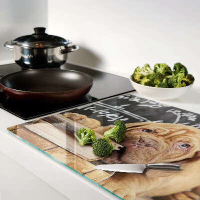 Tabla de cortar Perro con libros y una pizarra.