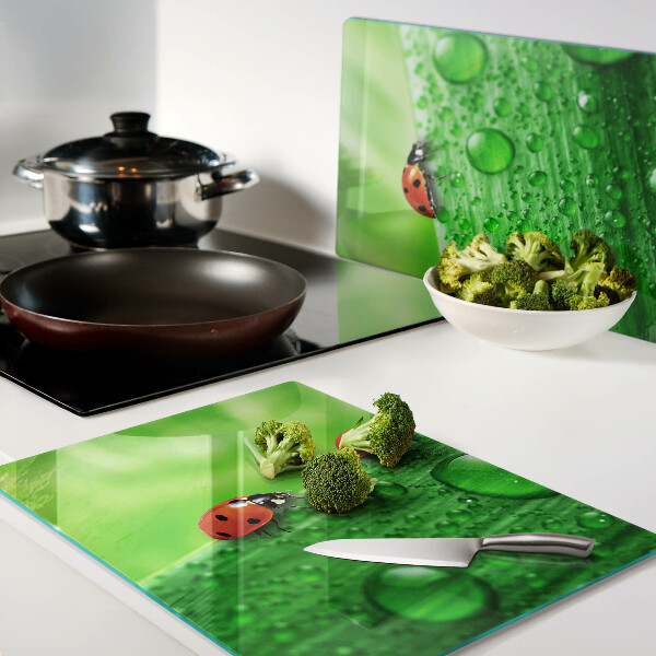 Deska kuchenna szklana Biedronki na zielonym tle