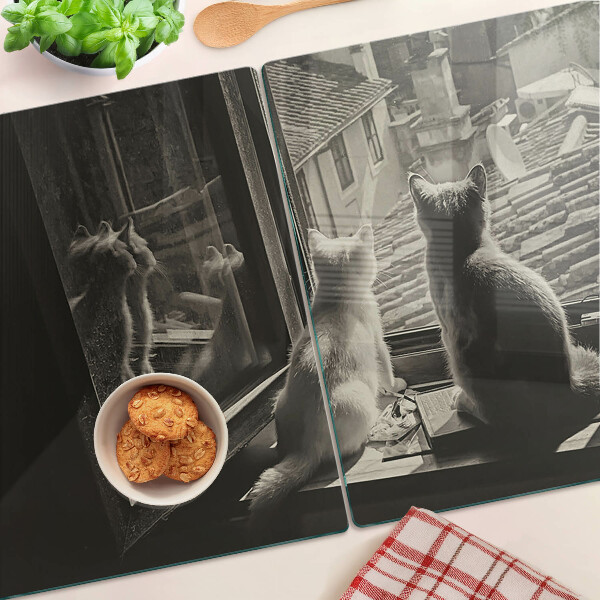 Tabla de cortar Gatos en la ventana