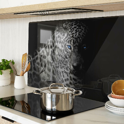 Tabla de cortar de cristal Pantera izquierda con ojos azules.