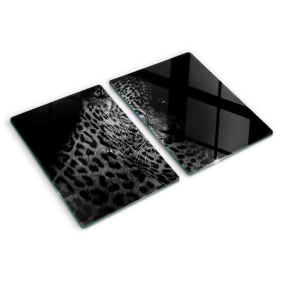 Tabla de cortar de cristal Pantera izquierda con ojos azules.