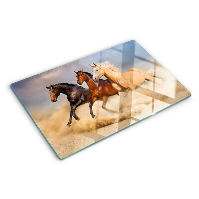 Tabla de cortar Caballos al galope en movimiento