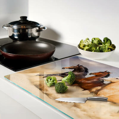 Tabla de cortar Caballos al galope en movimiento