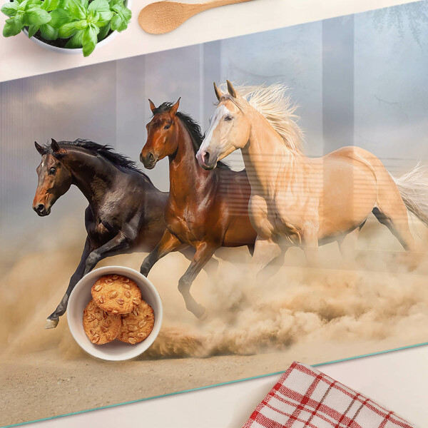 Tabla de cortar Caballos al galope en movimiento