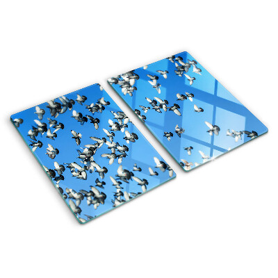 Tabla de cortar Palomas volando en el cielo