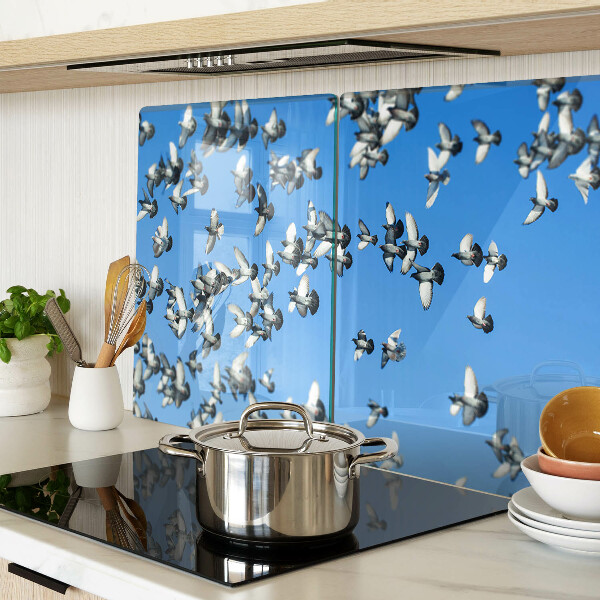 Tabla de cortar Palomas volando en el cielo