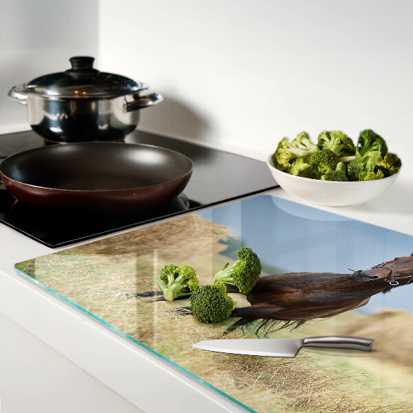 Tabla para cortar Un caballo en el prado