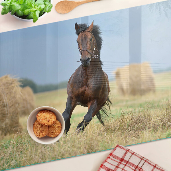 Tabla para cortar Un caballo en el prado