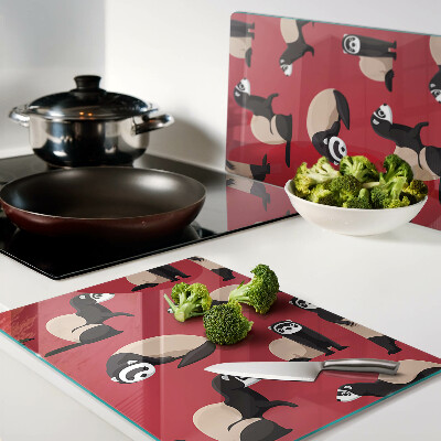 Tabla para cortar Hurones sobre un fondo rojo