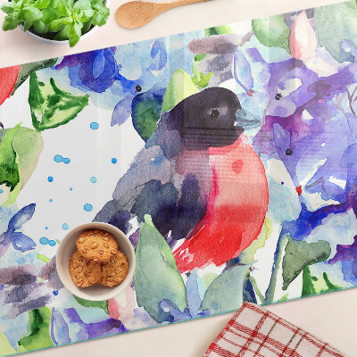 Tabla de cocina Un pájaro sobre un fondo de flores.
