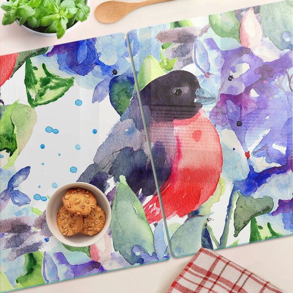 Tabla de cocina Un pájaro sobre un fondo de flores.