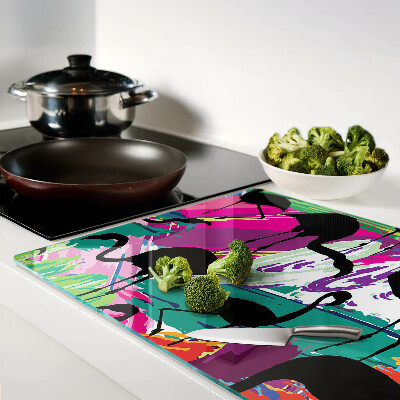 Tabla para cortar Flamencos sobre un fondo colorido