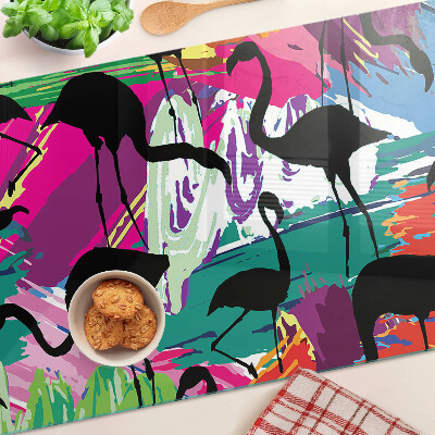 Tabla para cortar Flamencos sobre un fondo colorido