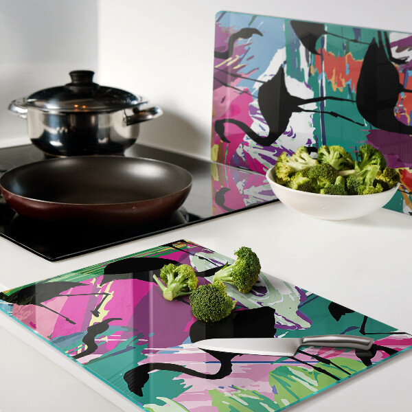 Tabla para cortar Flamencos sobre un fondo colorido