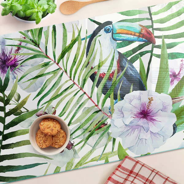 Tabla de cortar Motivo tropical con pájaros y plantas.