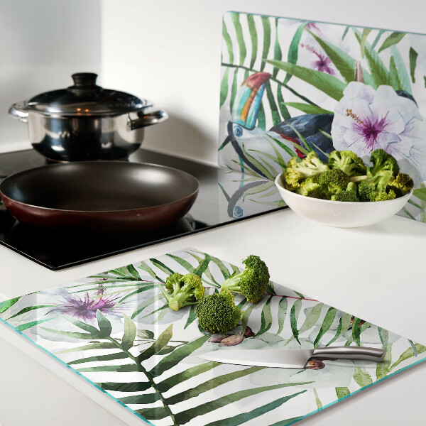 Tabla de cortar Motivo tropical con pájaros y plantas.