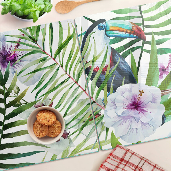 Tabla de cortar Motivo tropical con pájaros y plantas.