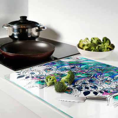 Tabla de cortar Plumas de pavo real en colores verde y azul.