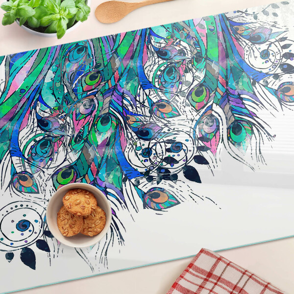 Tabla de cortar Plumas de pavo real en colores verde y azul.