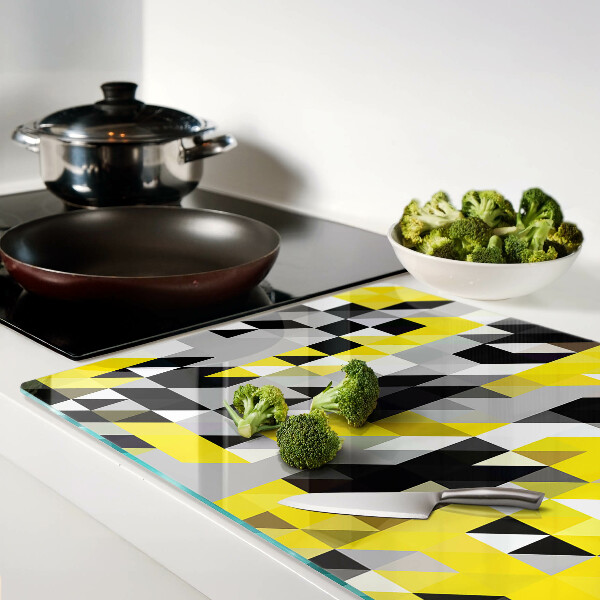 Tabla de cortar Geometría en tonos amarillos y negros.