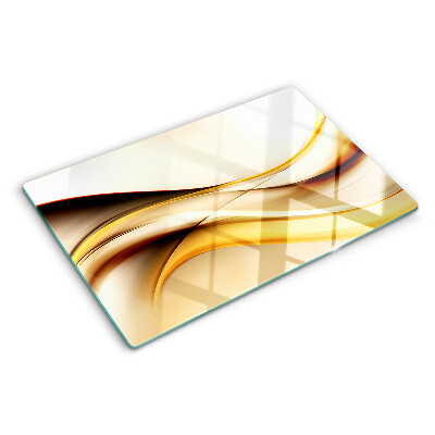 Tabla de cortar de cristal Ondas abstractas en tonos dorados