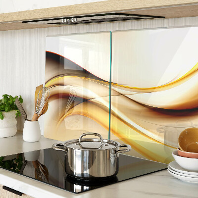 Tabla de cortar de cristal Ondas abstractas en tonos dorados