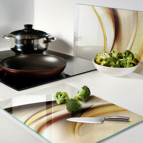 Deska kuchenna szklana Abstrakcyjne fale w odcieniach złota