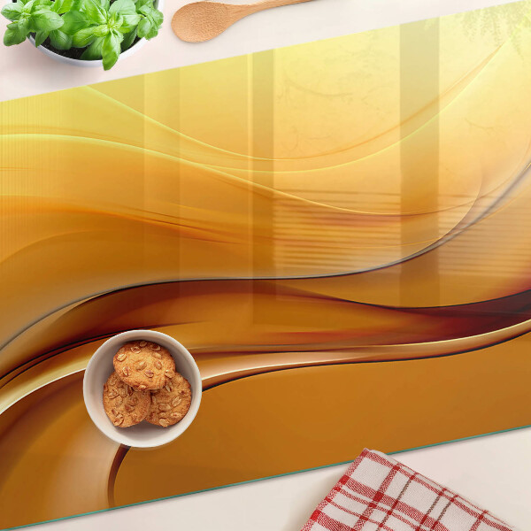 Tabla de cortar Ondas en tonos dorados