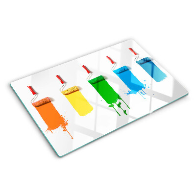 Tabla de cocina Un arcoíris de pinturas en pinceles.