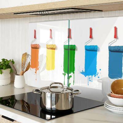 Tabla de cocina Un arcoíris de pinturas en pinceles.