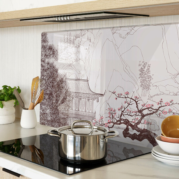 Szklana deska kuchenna Krajobraz górski z kwitnącymi drzewami