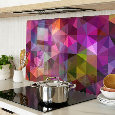 Tabla de cortar de cristal Geometría en tonos rosa y morado.