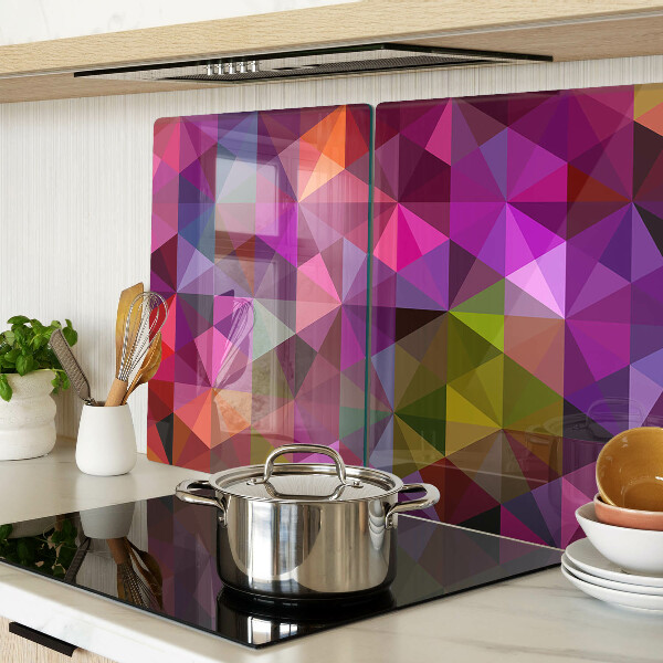 Tabla de cortar de cristal Geometría en tonos rosa y morado.