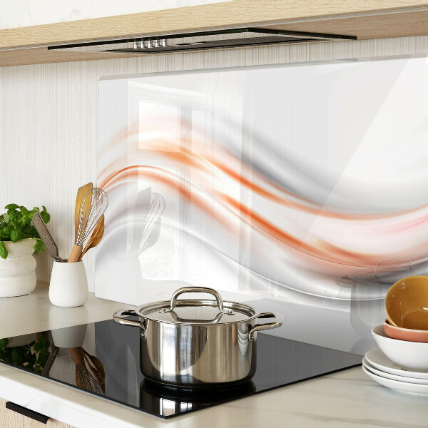 Tabla para cortar Ondas en tonos naranja y gris.