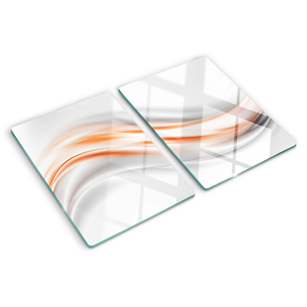 Tabla para cortar Ondas en tonos naranja y gris.