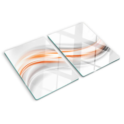 Tabla para cortar Ondas en tonos naranja y gris.