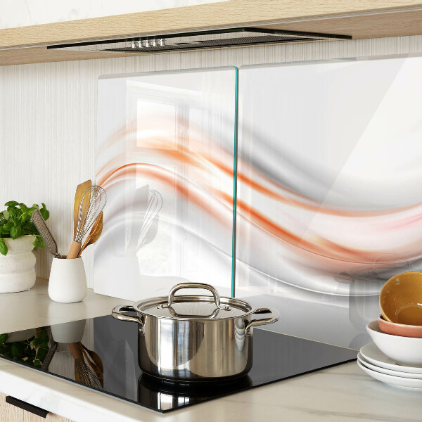 Tabla para cortar Ondas en tonos naranja y gris.